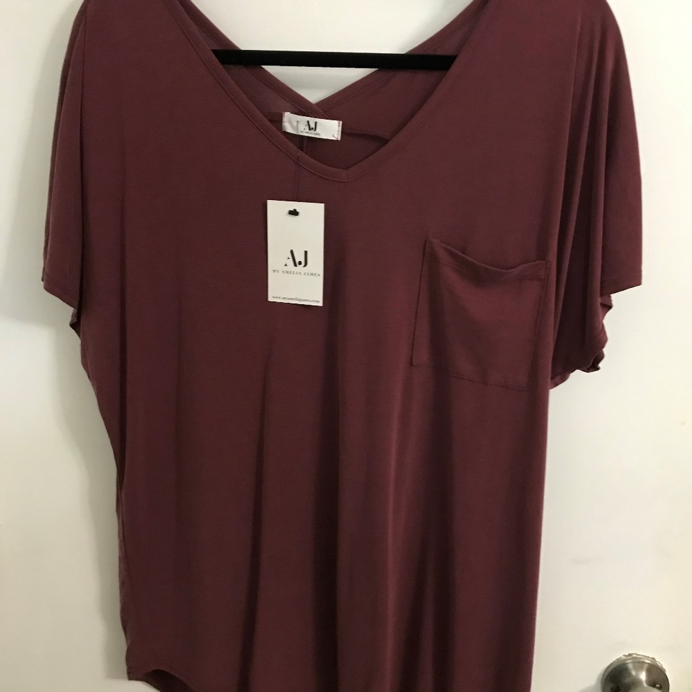 V neck top in dark mauve hi-lo with pocket